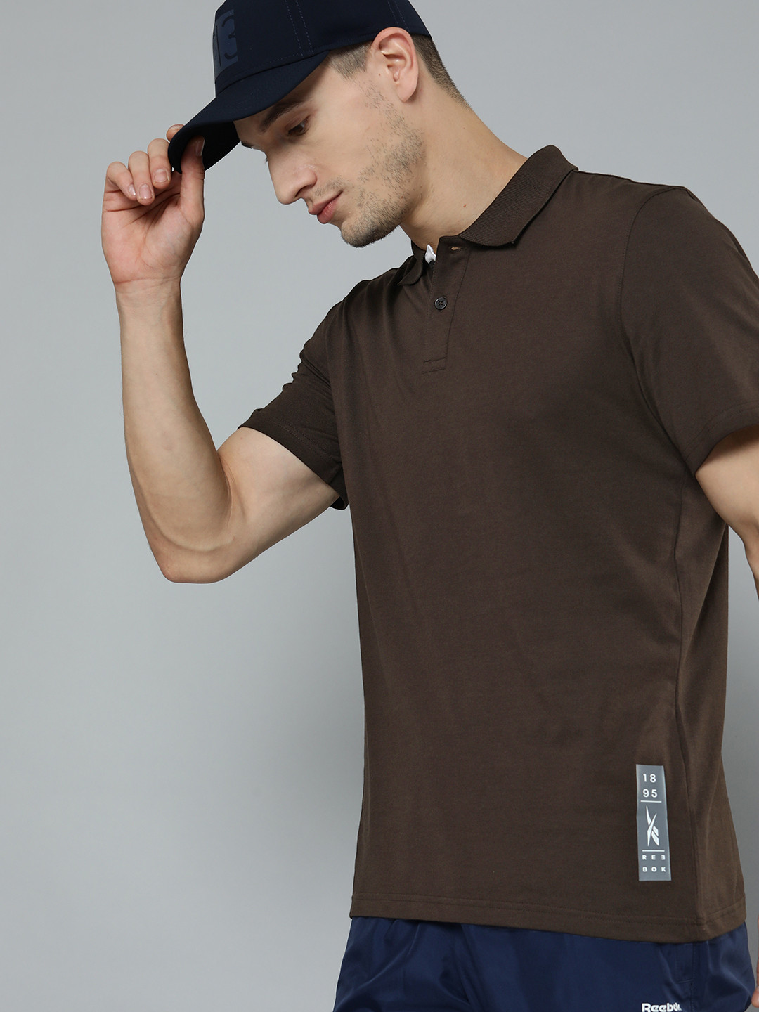 Reebok Men Brown Solid Polo Collar Pure Cotton T-shirt