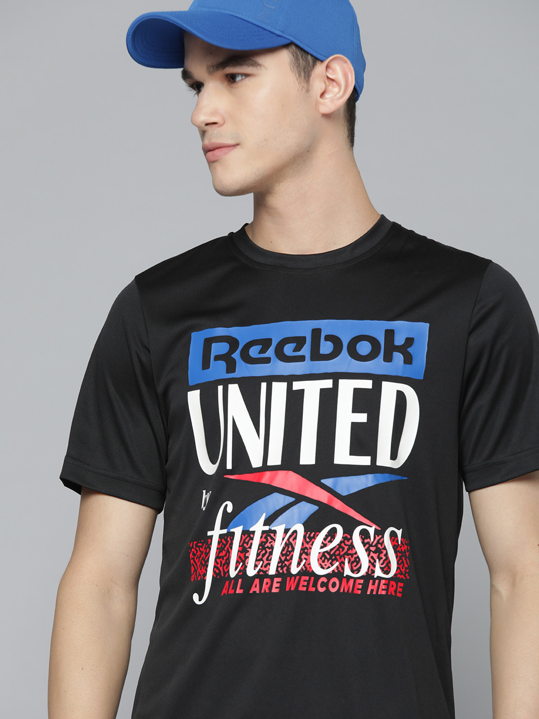 Reebok Men Black & White Brand Logo Printed Speedwick Slim Fit T-shirt