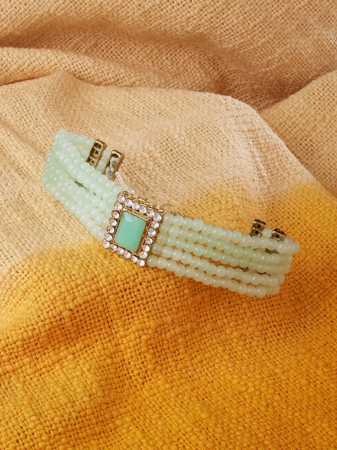 Zaveri Pearls Women Green Bracelet