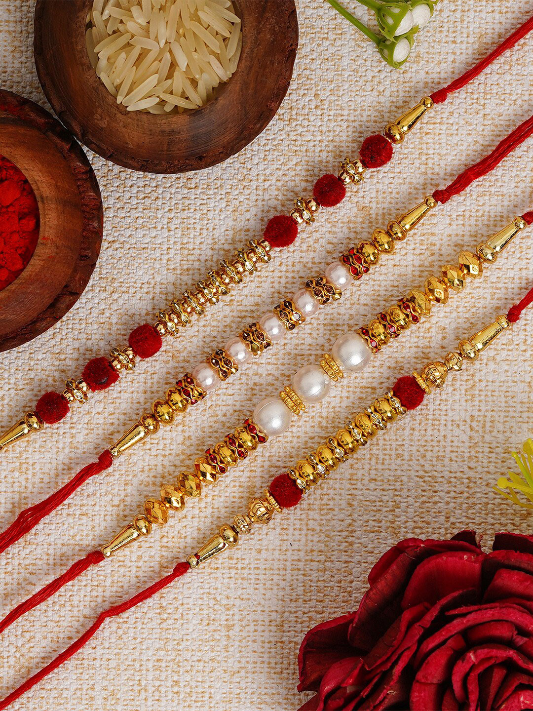 eCraftIndia Red & White Pack of 4 Pearl Rakhis and Roli Chawal