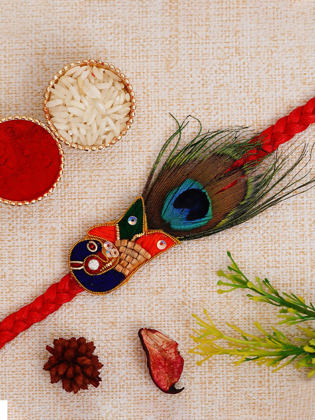 eCraftIndia Red & Green Peacock Feather Rakhi Set