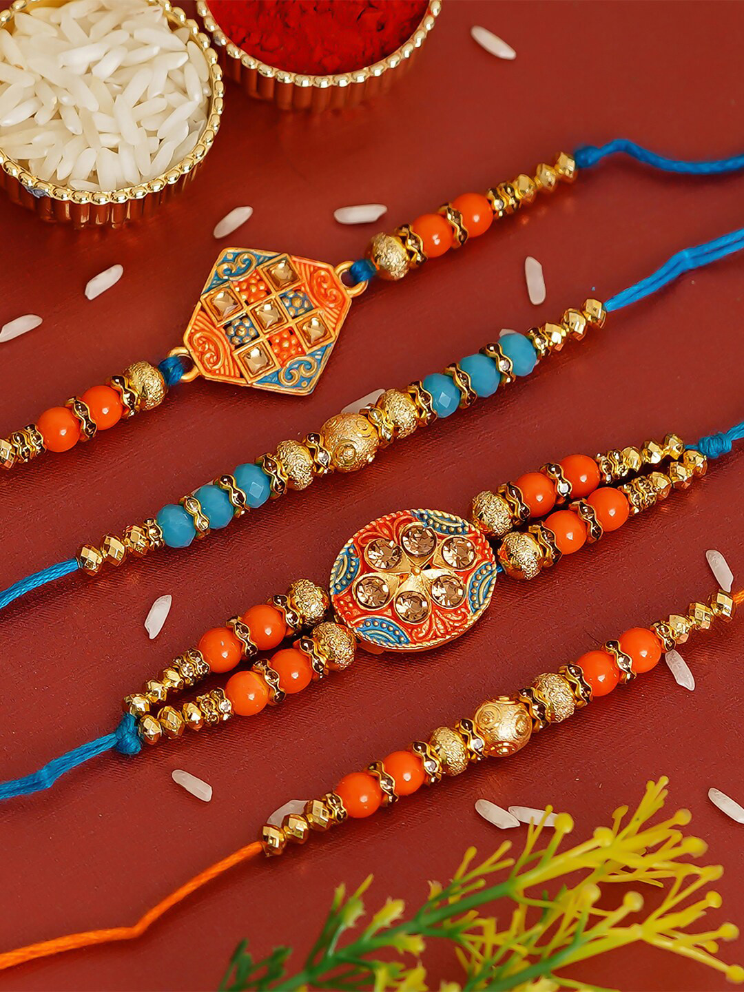 eCraftIndia Set of 4 Blue & Orange Designer Pearl Rakhi with Roli Chawal