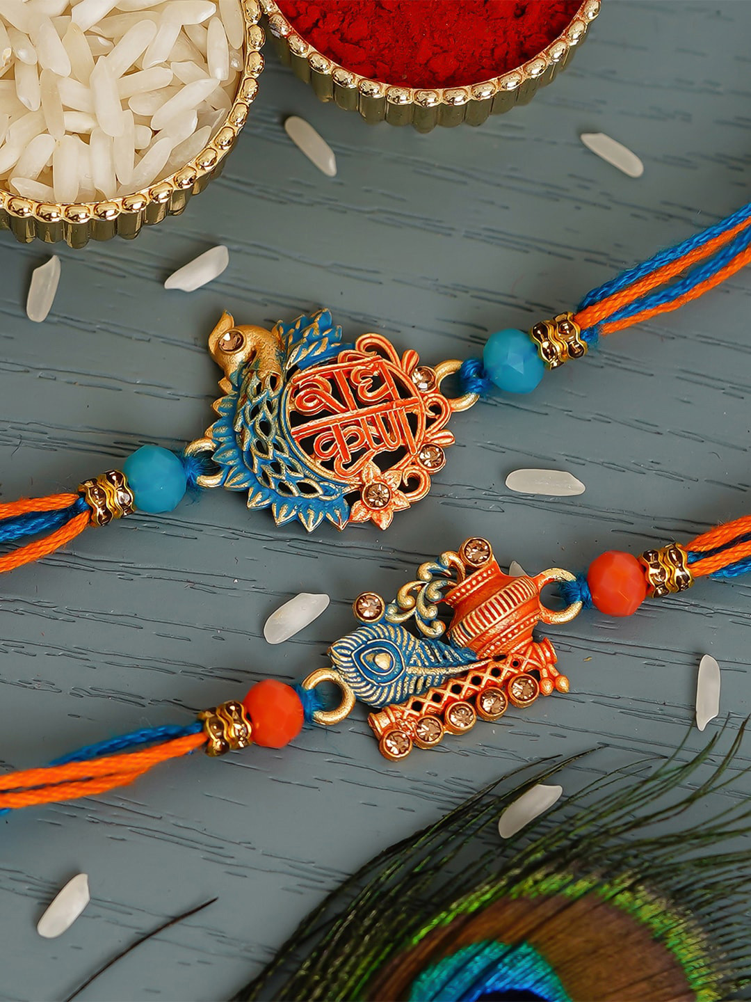 eCraftIndia Set Of 2 Blue & Orange Religious Studded Rakhis