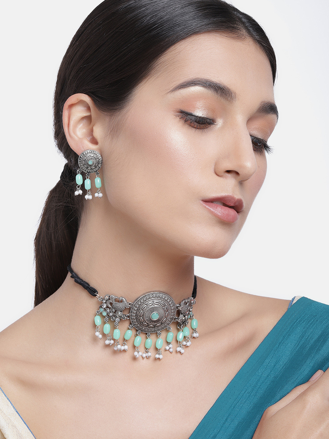 Kord Store Mint Green Silver-Plated Oxidized Beaded Peacock Shaped Choker Jewellery Set