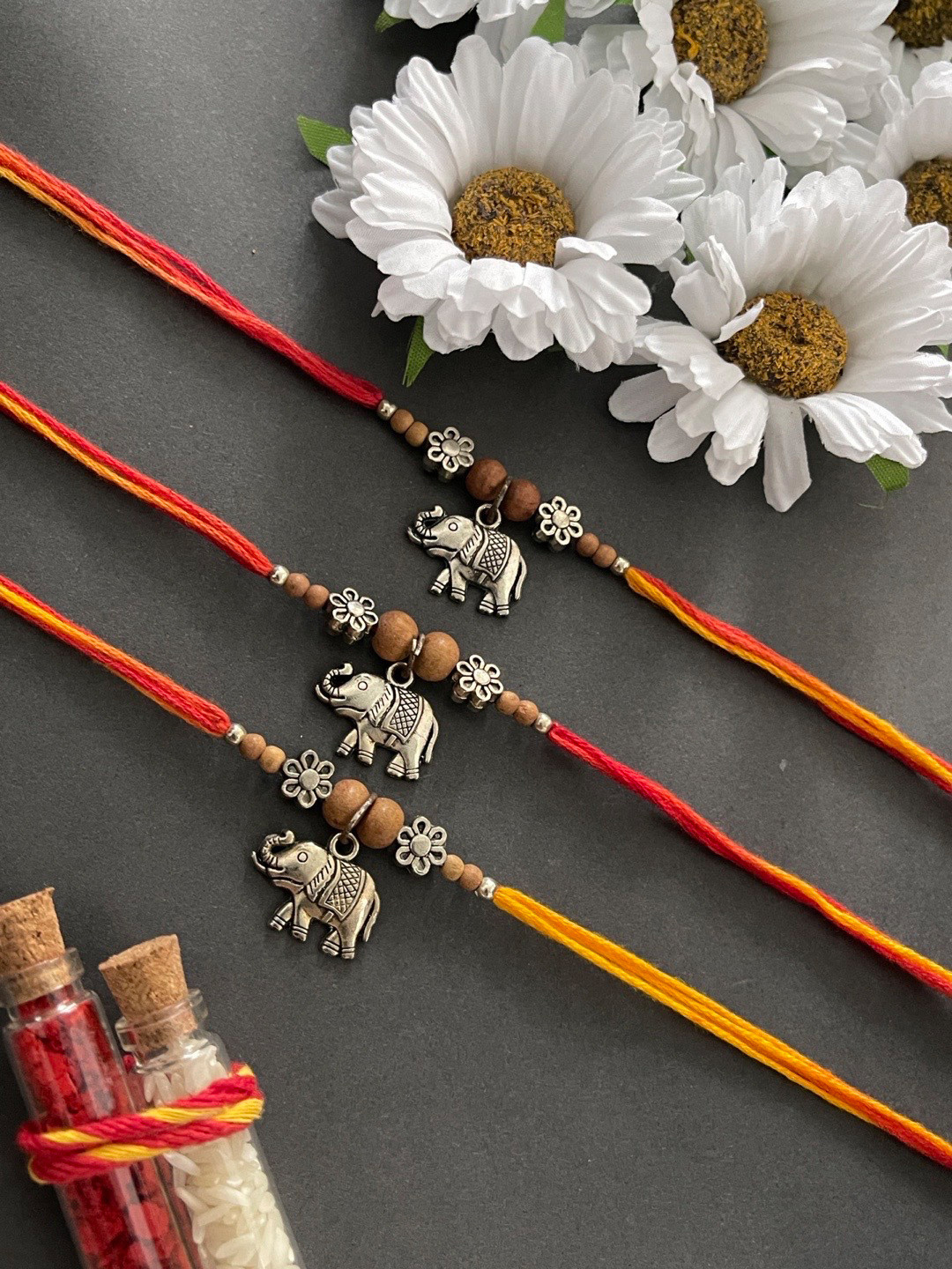 Digital Dress Room Men Set Of 3 Silver-Plated & Red Beaded Elephant & Floral & Tulsi Charm Rakhi With Roli Chawal