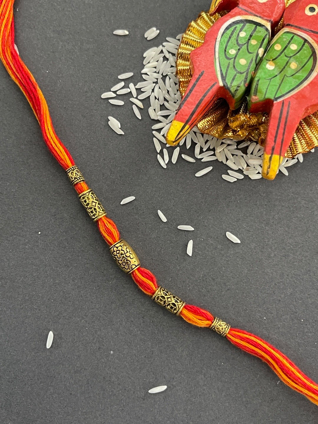 Digital Dress Room Men Red Solid Beaded Rakhi