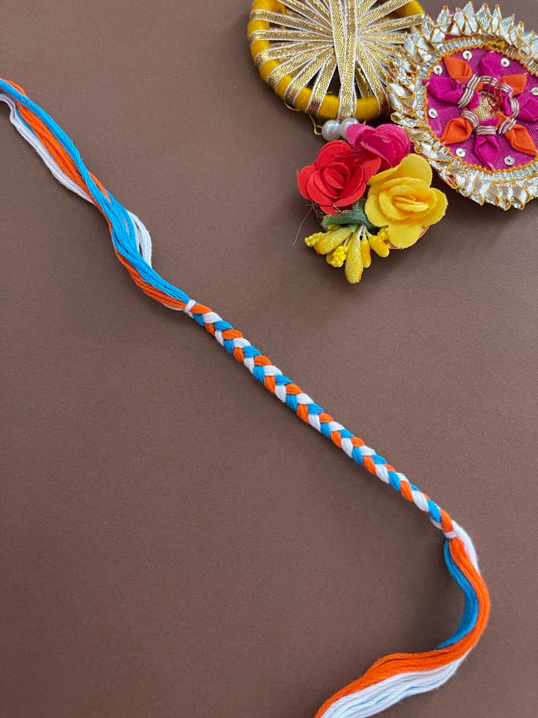 Digital Dress Room Men Orange & Blue Braided Rakhi With Roli