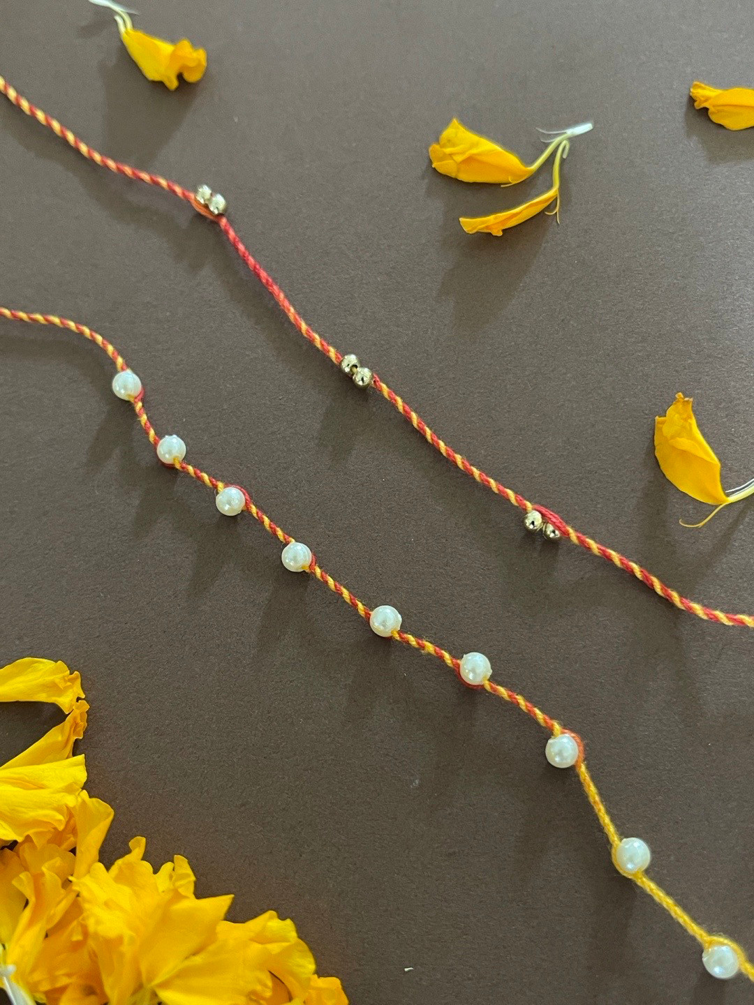 Digital Dress Room Men Set Of 2 Red & Yellow Pearl Beaded Rakhi