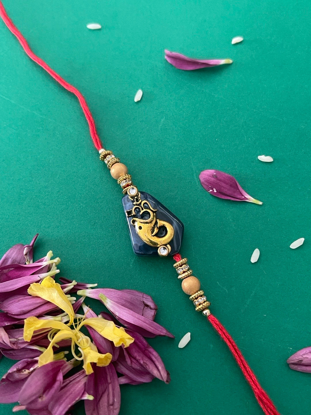 Digital Dress Room Men Red & Blue Beaded & Lord Ganesh & Om-Charm Rakhi With Roli