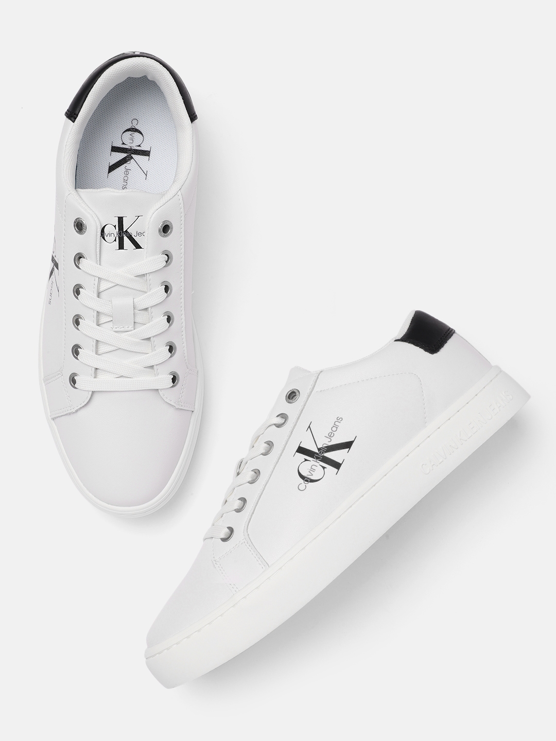 Buy Calvin Klein Men White Solid Leather Regular Sneakers With Brand Logo Print Detail Casual Shoes for Men 18799972 Myntra