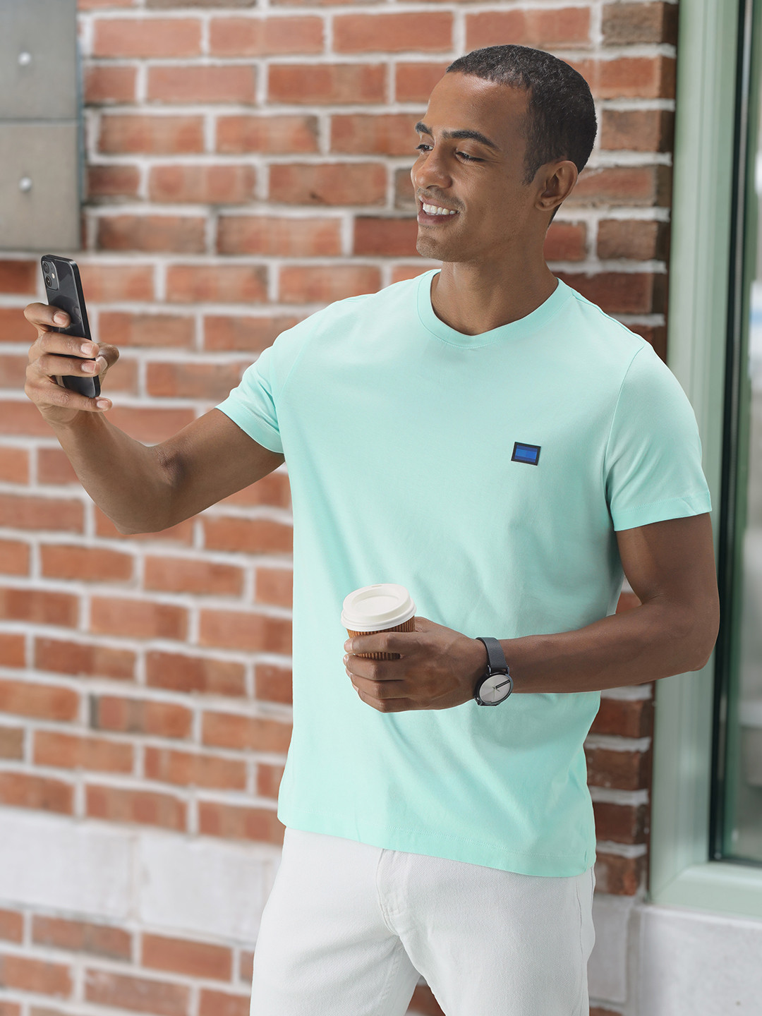 Tommy Hilfiger Men Sea Green Solid T-shirt