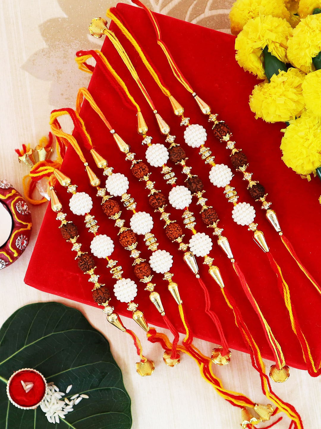 TIED RIBBONS Set of 9 Red & Yellow Pearls Rudraksha Rakhi