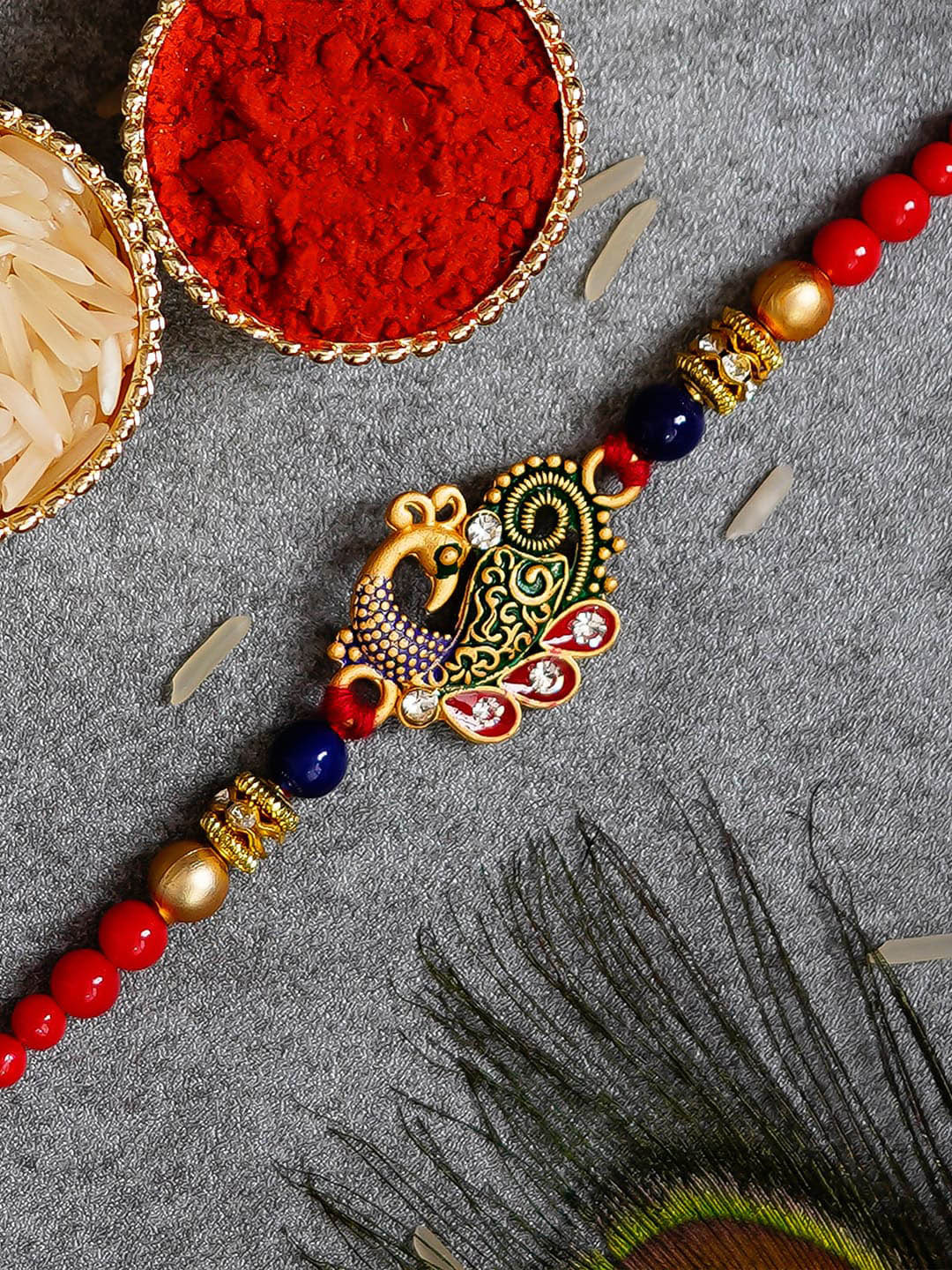 eCraftIndia Red Peacock Rakhi with Roli Chawal