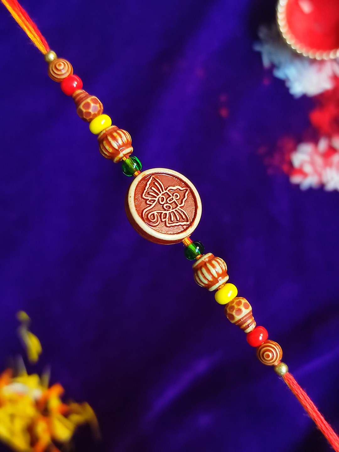 CRAYTON Men Multi Color Coin Ganesha with Neon Beads Rakhi