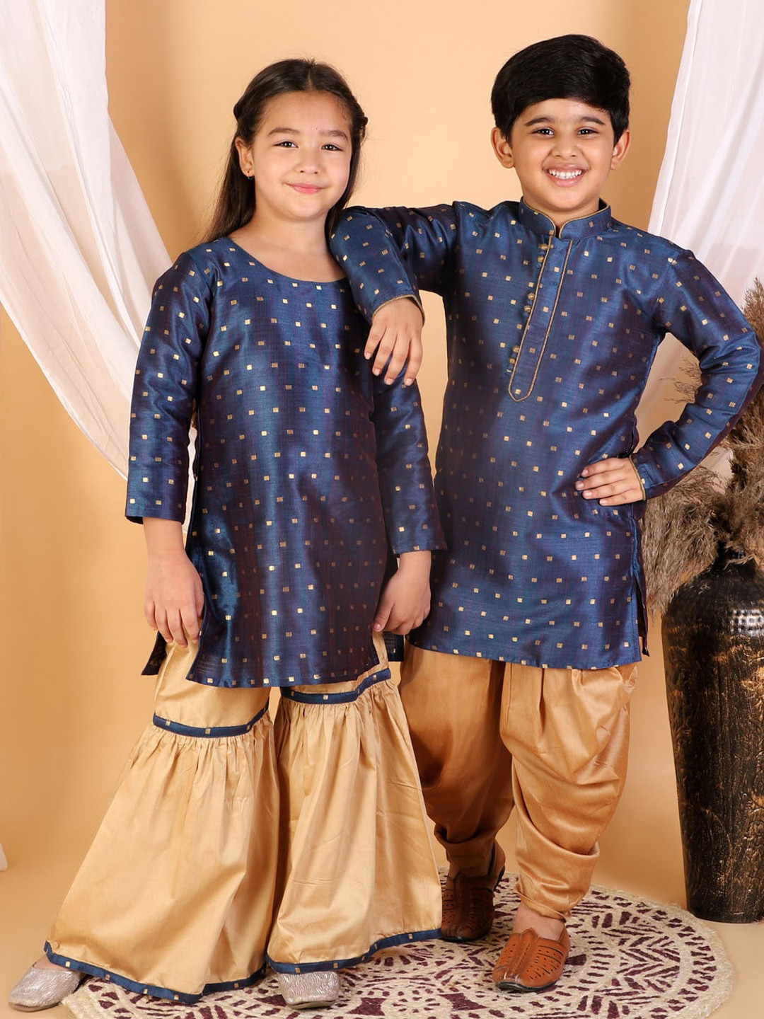VASTRAMAY Girls Blue & Rose Gold Embellished Kurta And Sharara Set