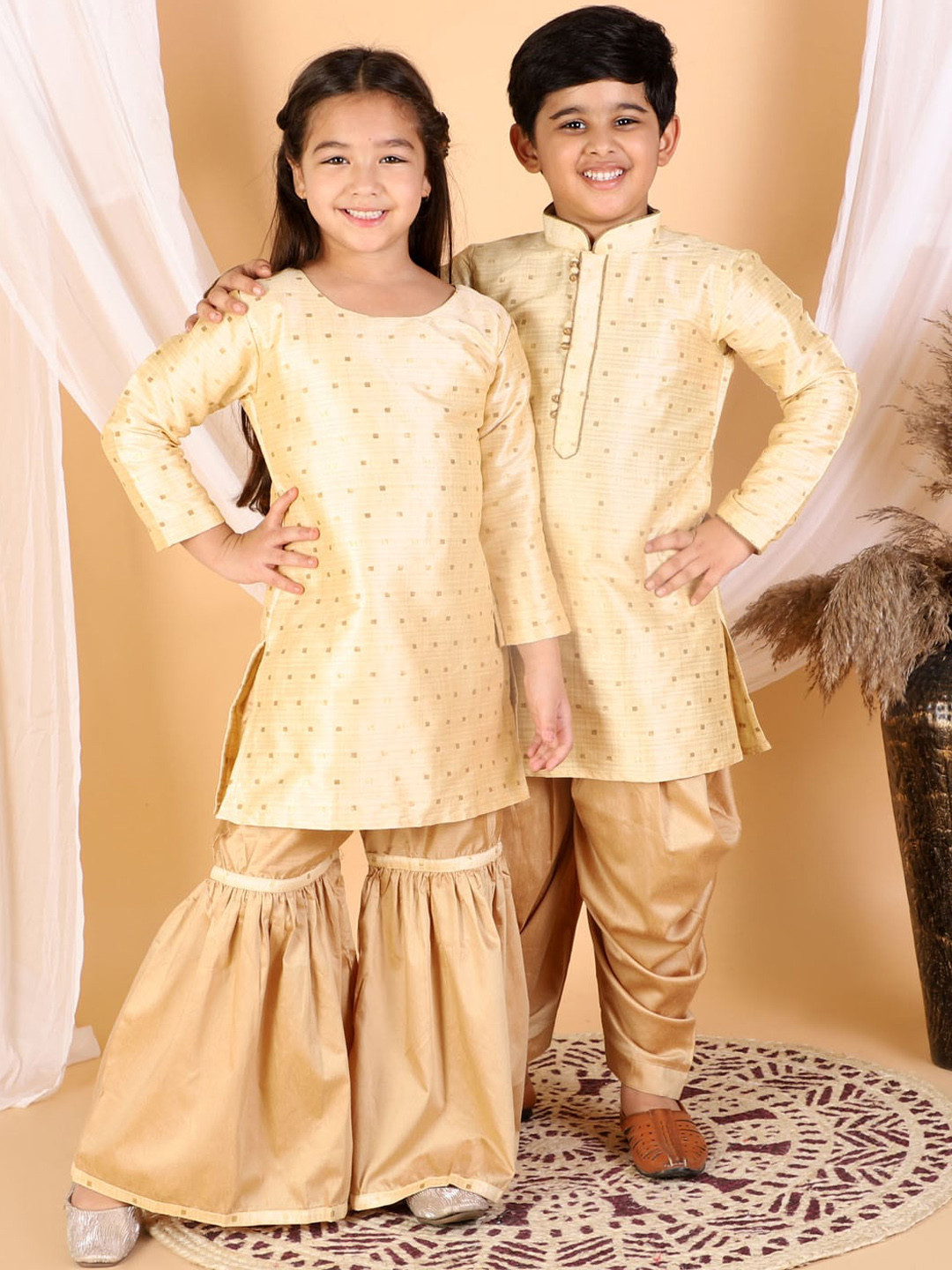 VASTRAMAY Girls Gold-Toned & Rose Gold Embellished Kurta And Sharara