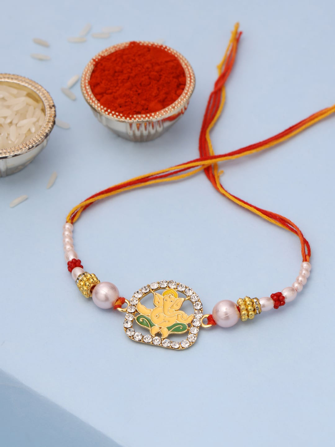 VIRAASI Men Red & Yellow Religious Lord Ganesha Thread Rakhi