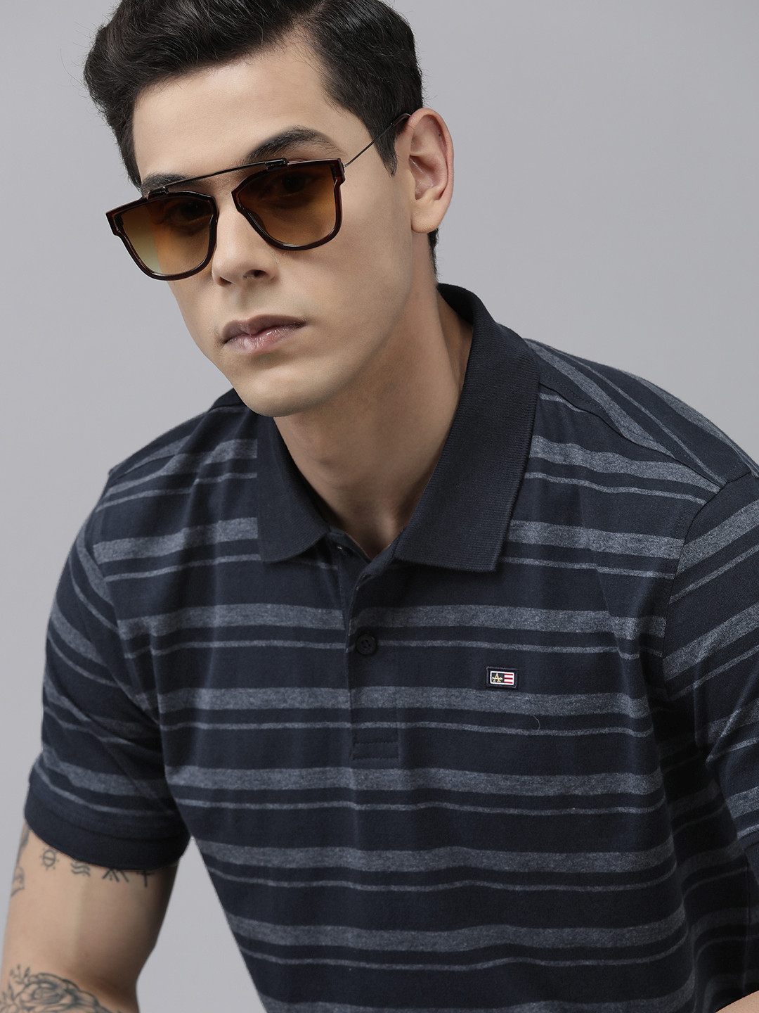 Arrow Men Navy Blue Striped Polo Collar Indigo Brand Logo Applique Regular Fit T-shirt