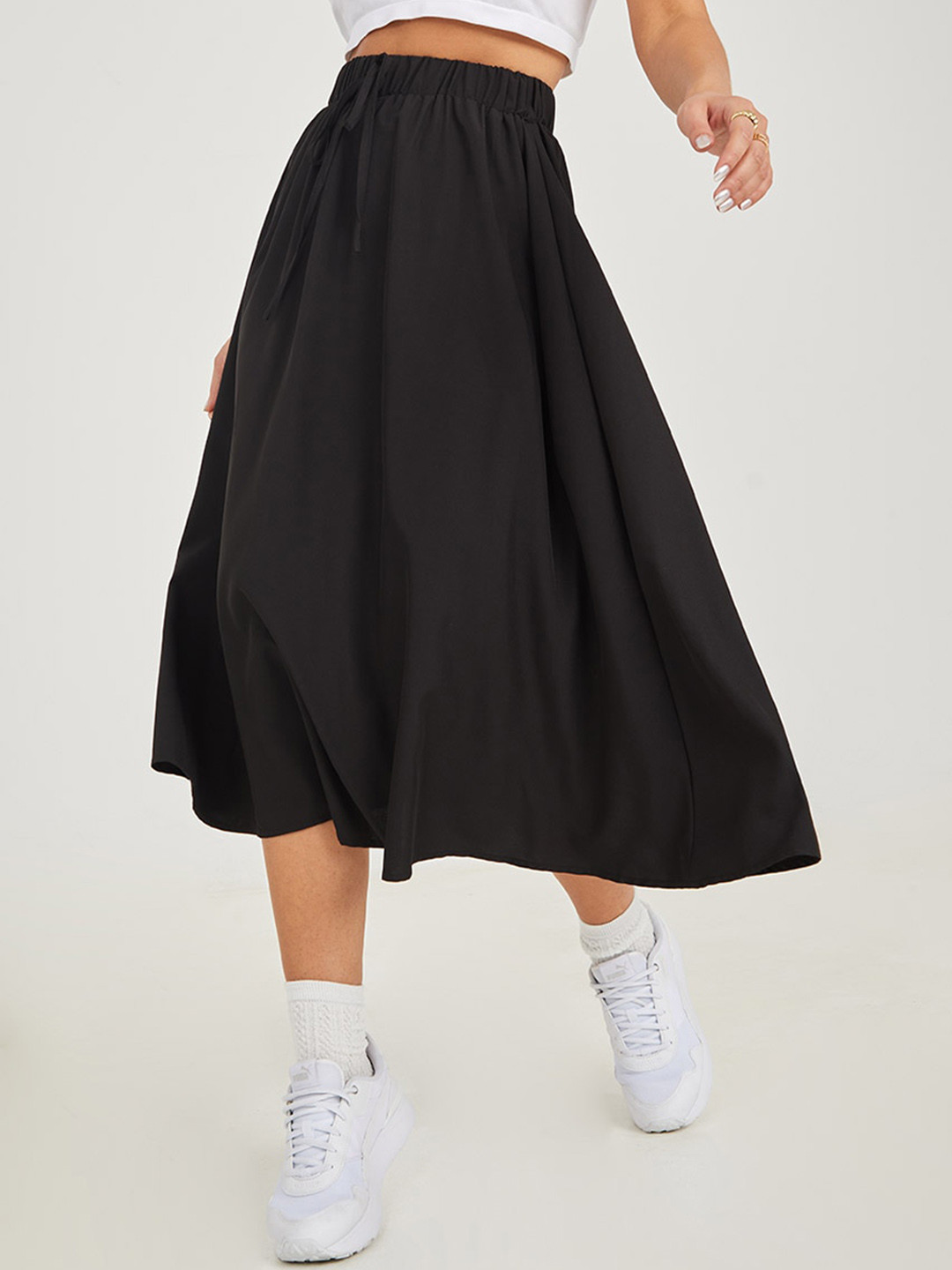 Styli Women Black Solid A-Line Midi Skirts