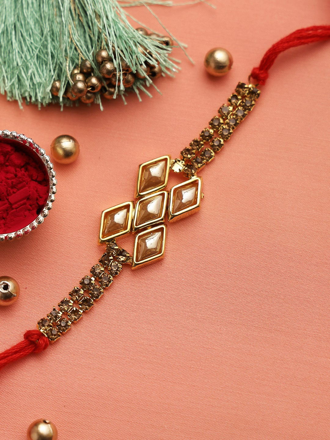 Aapno Rajasthan Adults Gold-Toned & Red Handcrafted Uncut Diamonds Bracelet Style Rakhi