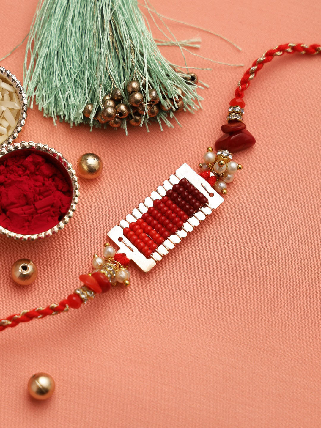 Aapno Rajasthan Red & Silver-Toned Beads with Uncut Coral Jeweled Rakhi Set
