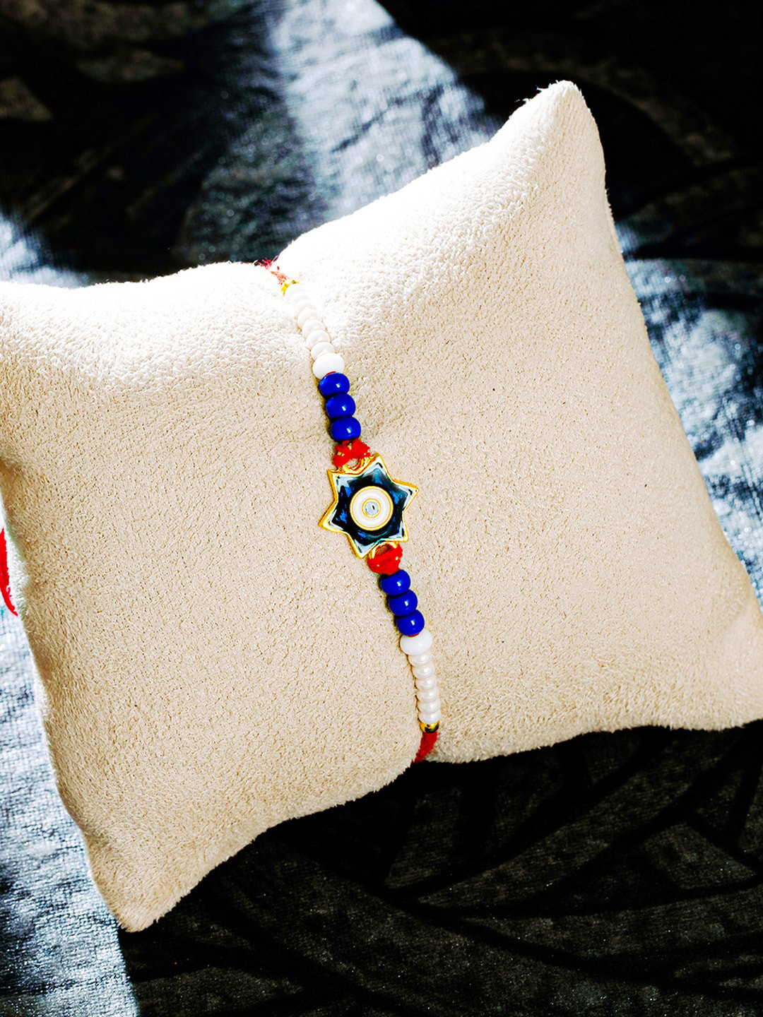 Sukkhi Rakhi Gold Plated Star Evil Eye Rakhi with Roli Chawal and Rakhi Greeting Card