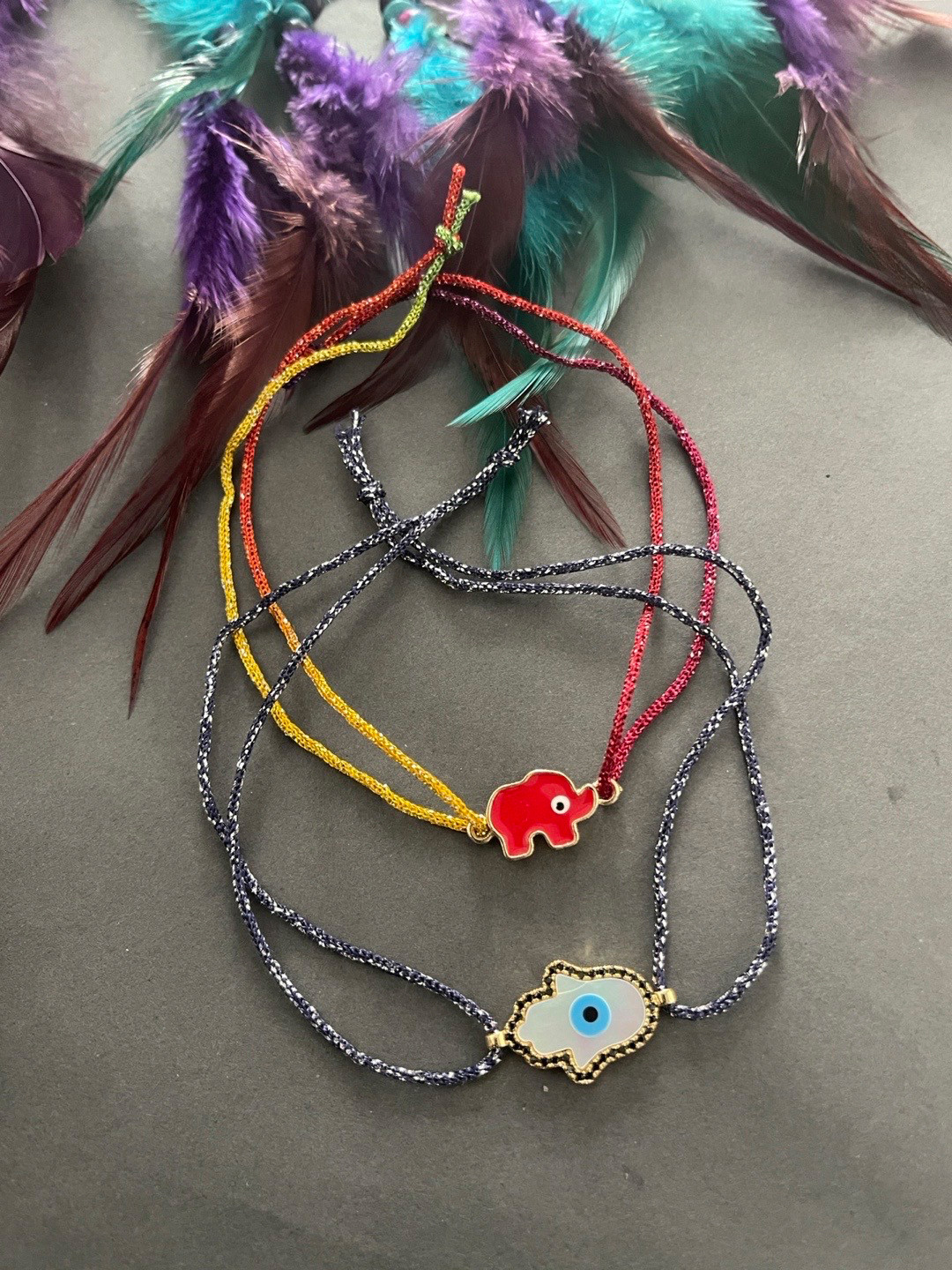 Digital Dress Room Men Set of 2 Blue & Red Gold-Plated Evil Eye & Elephant Pendant Rakhi