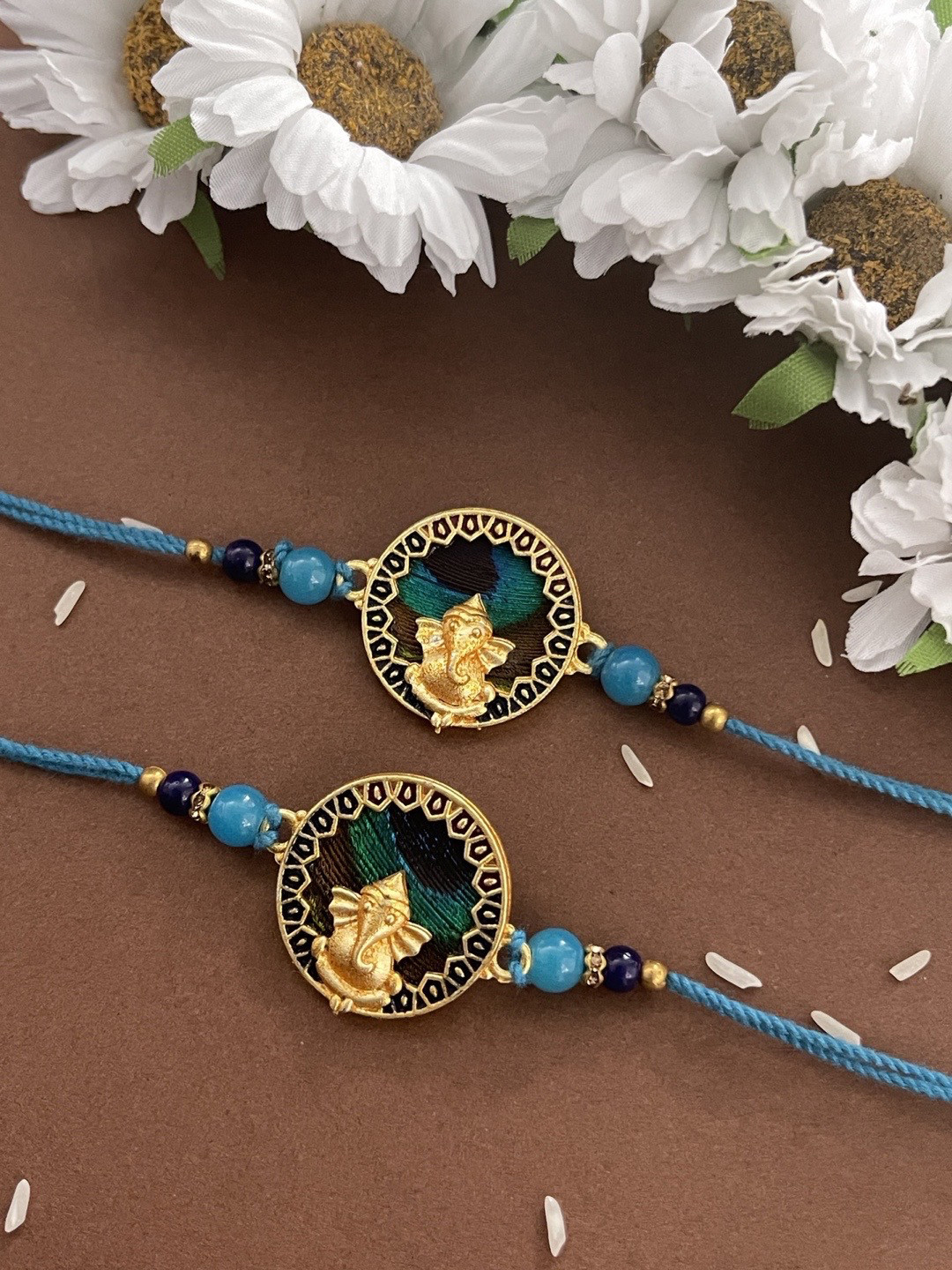 Digital Dress Room Men Set Of 2 Gold-Colored Blue Peacock Feather Lord Ganesha Rakhi