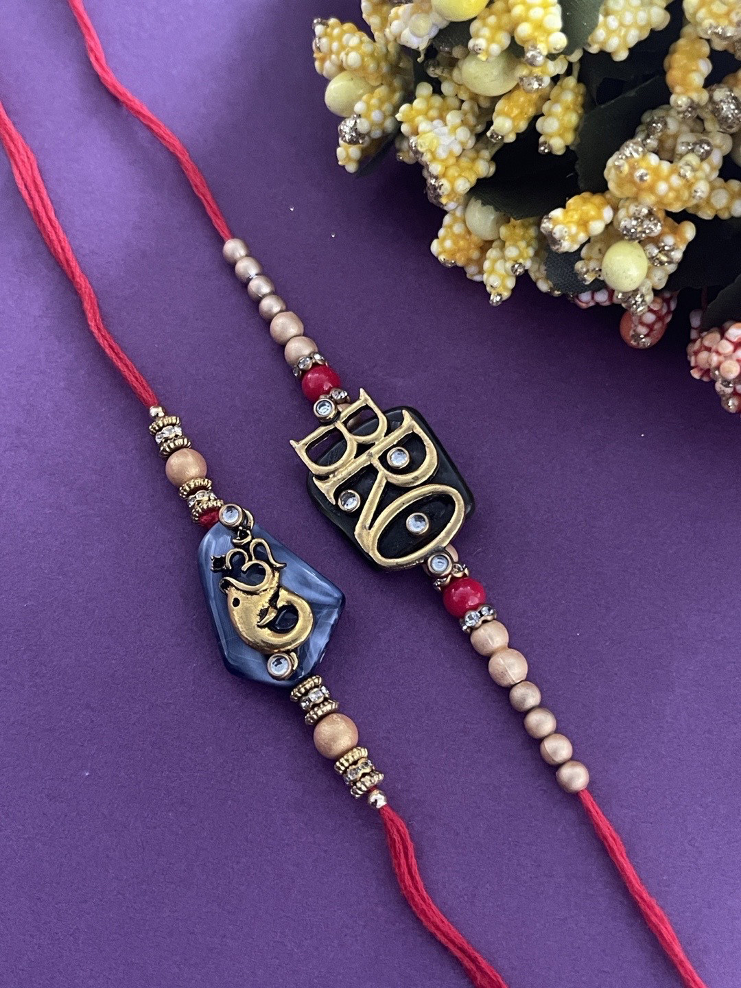 Digital Dress Room Men Set Of 2 Gold-Toned & Red Bro & Lord Ganesha Rakhi