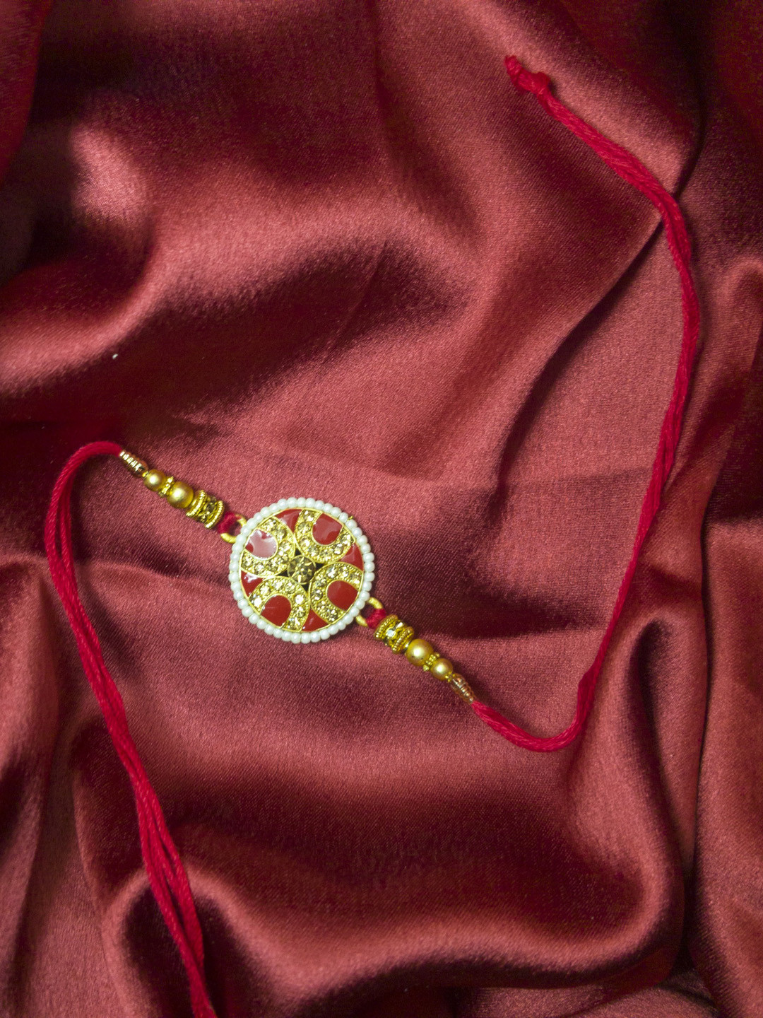 CRAYTON Men Gold-Toned & Red Diamond & Pearl Horse-Shoe Design Rakhi
