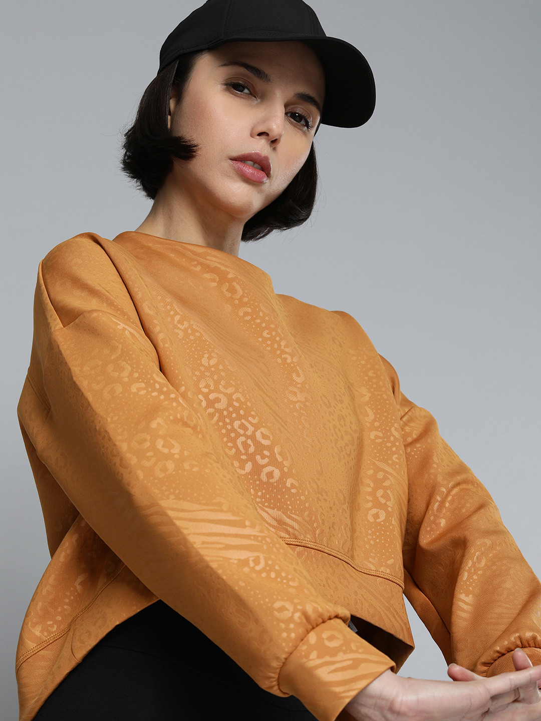 Puma Women Brown Self Designed Cut Out Detailed Casual Sweatshirt