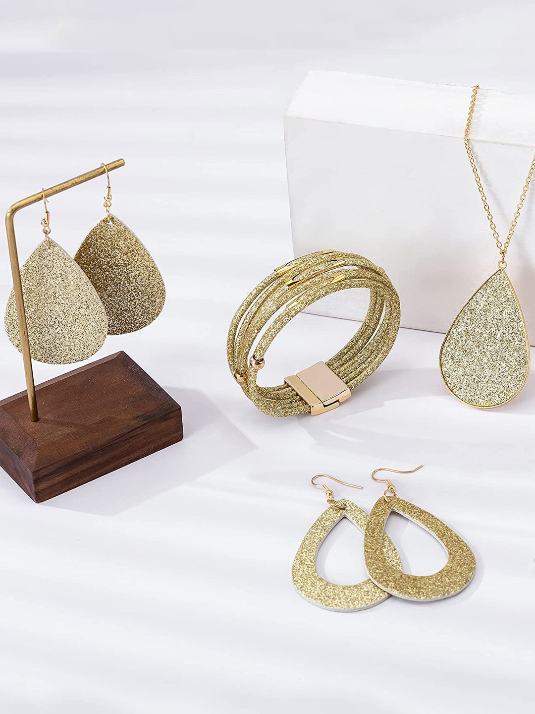 Yellow Chimes Women Gold-Plated Jewellery Set with Set of 4 Earrings & 1 Bracelet