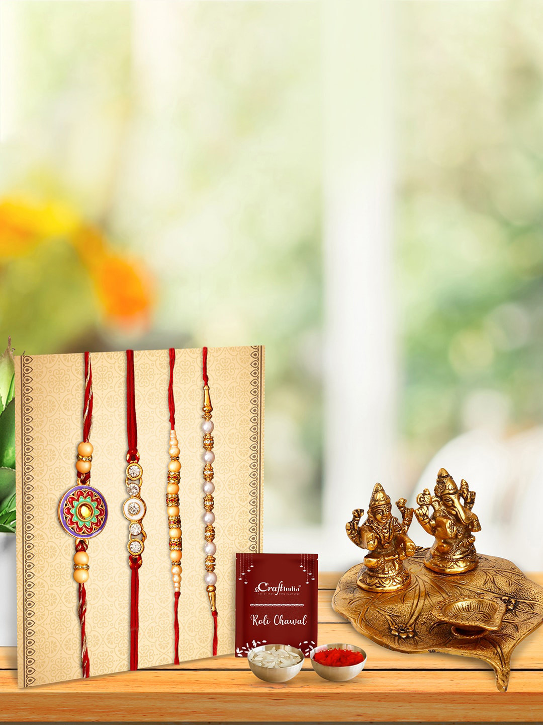 eCraftIndia Pack of 4 Pearl Rakhis With Lord Ganesha Idol & Roli Chawal & Greeting Card