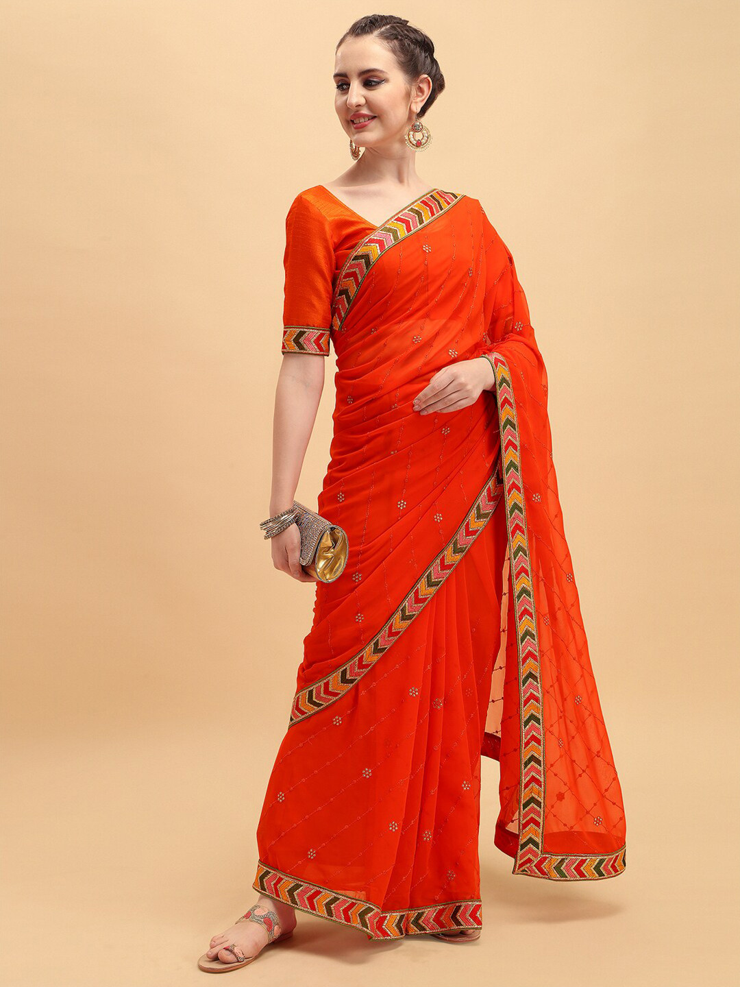 Sangria Women Orange Pure Georgette Heavy Border Celebrity Saree