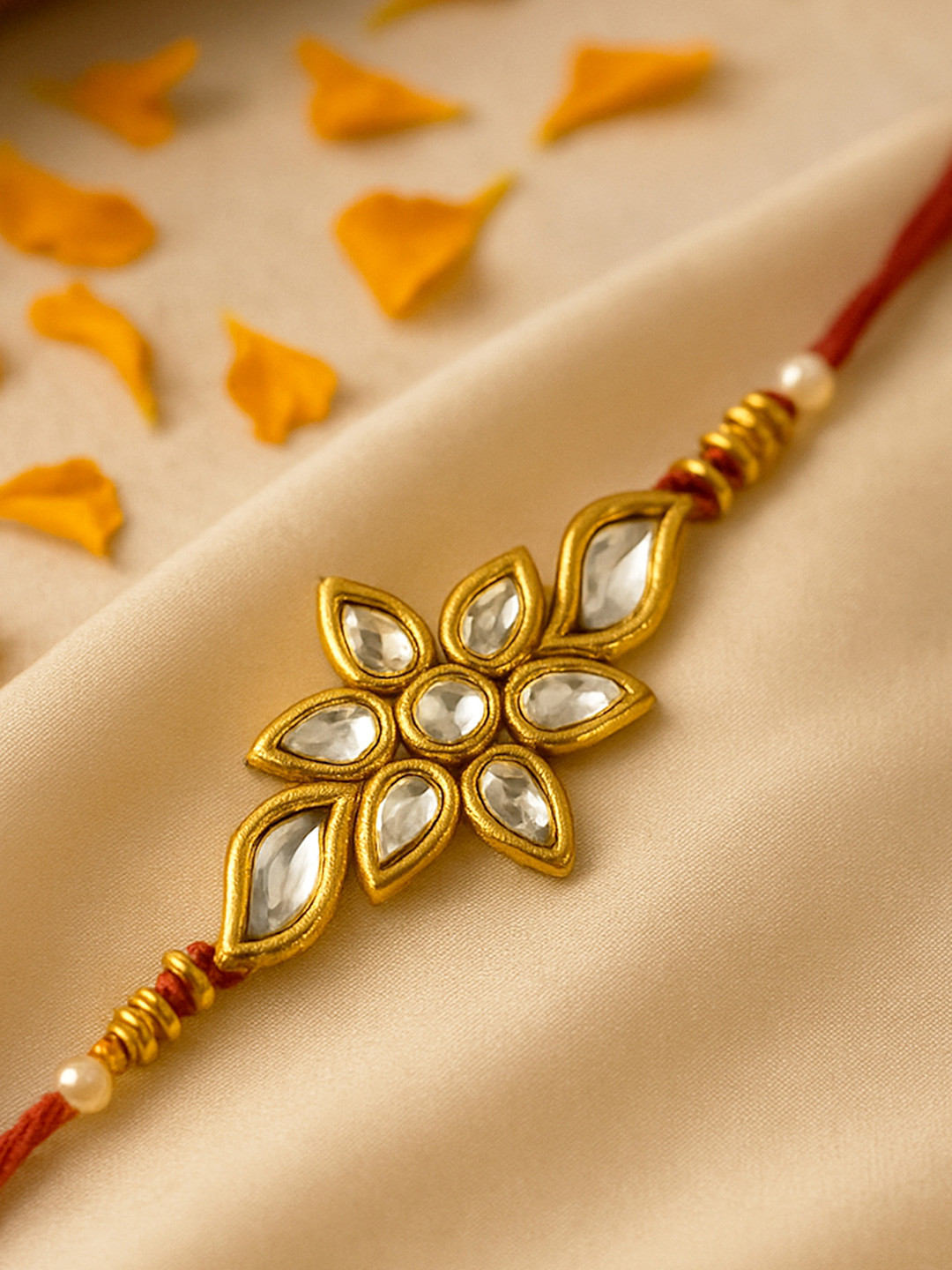 KARATCART Gold-Plated Red Kundan Rakhi with Roli & Chawal