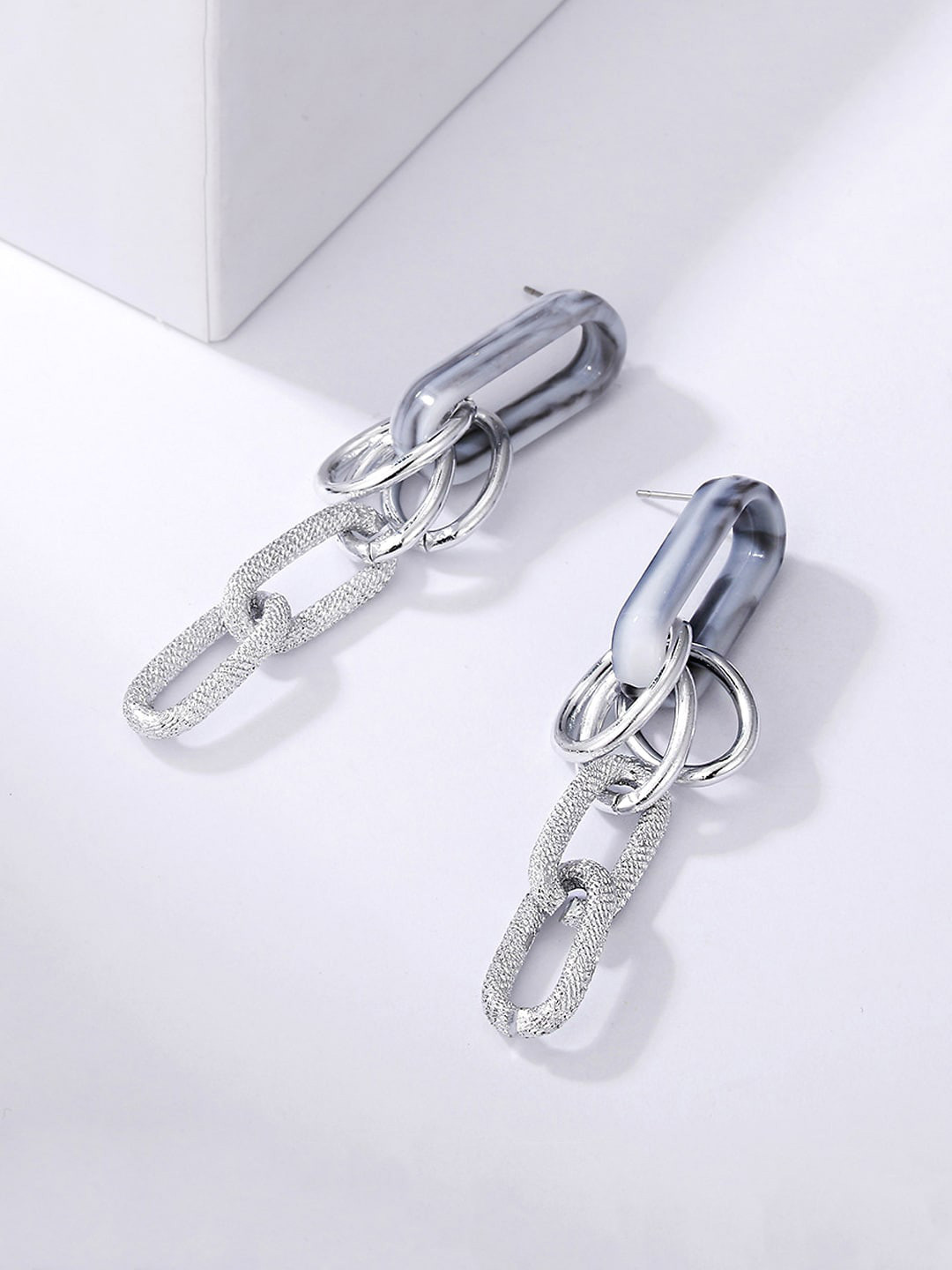 Unwind by Yellow Chimes Silver-Toned Contemporary Drop Earrings