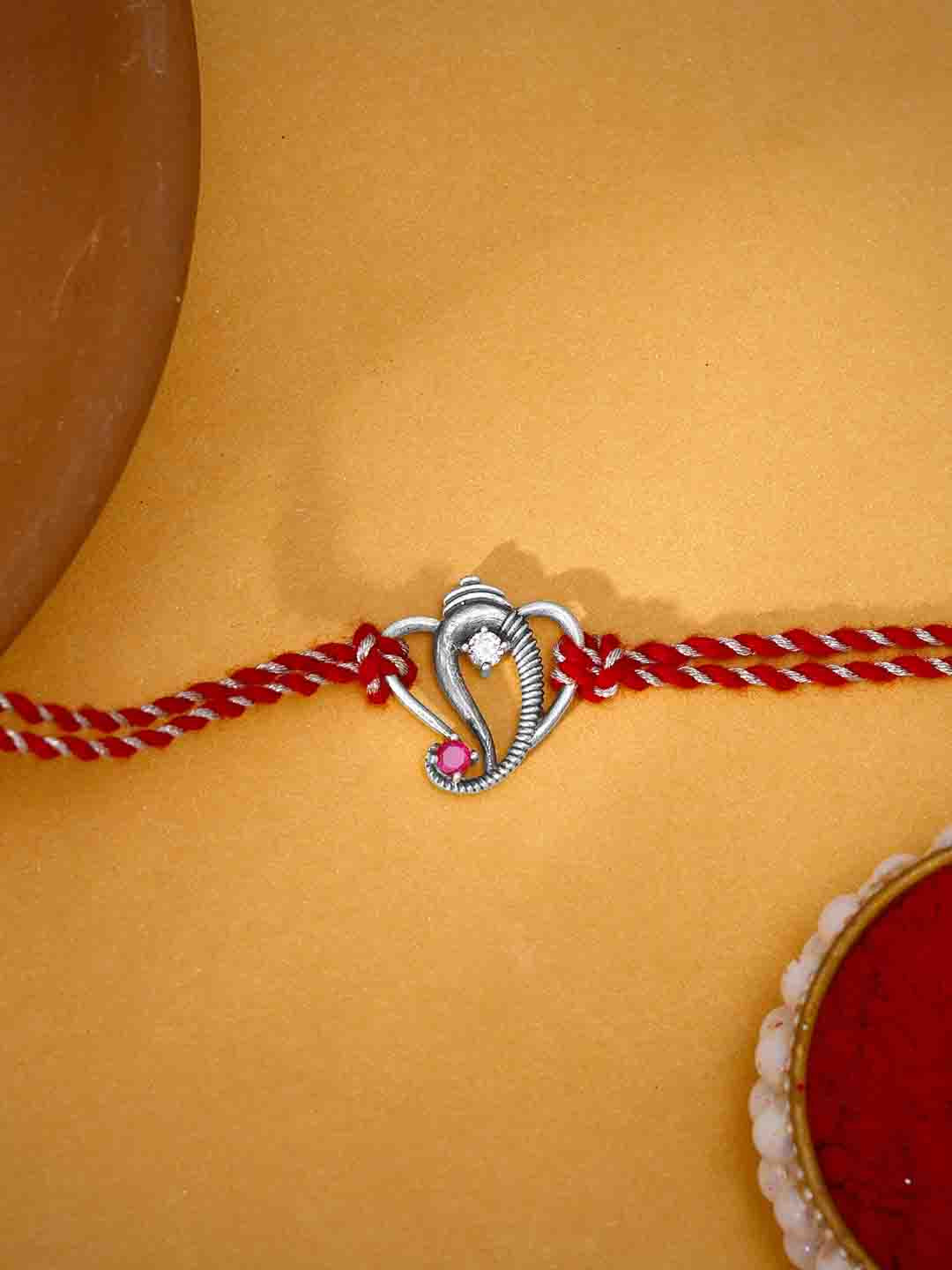 GIVA 925 Sterling Silver Silver-Toned & Red Ganeshji Rakhi with Roli Chawal