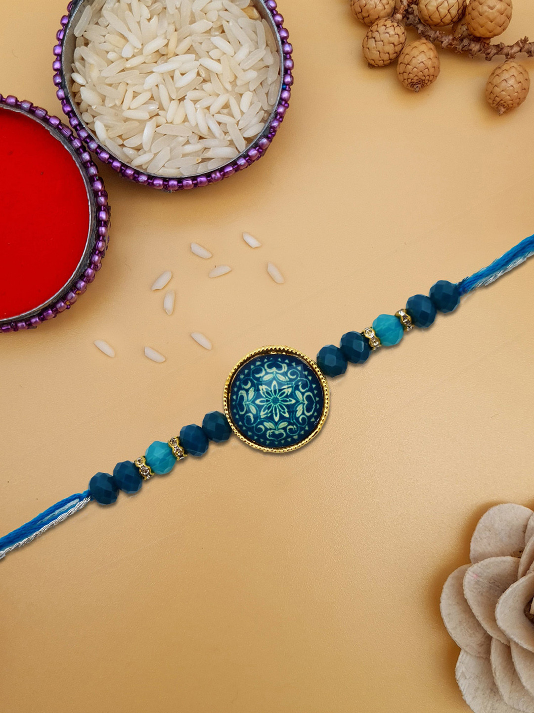 STYBUZZ Blue Designer Stone Painting Rakhi with Greeting Card and Roli Chawal