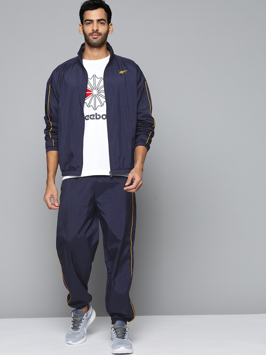 Buy Reebok Men Navy Blue Solid Workout Ready Track Suit Tracksuits for Men 19186428 Myntra