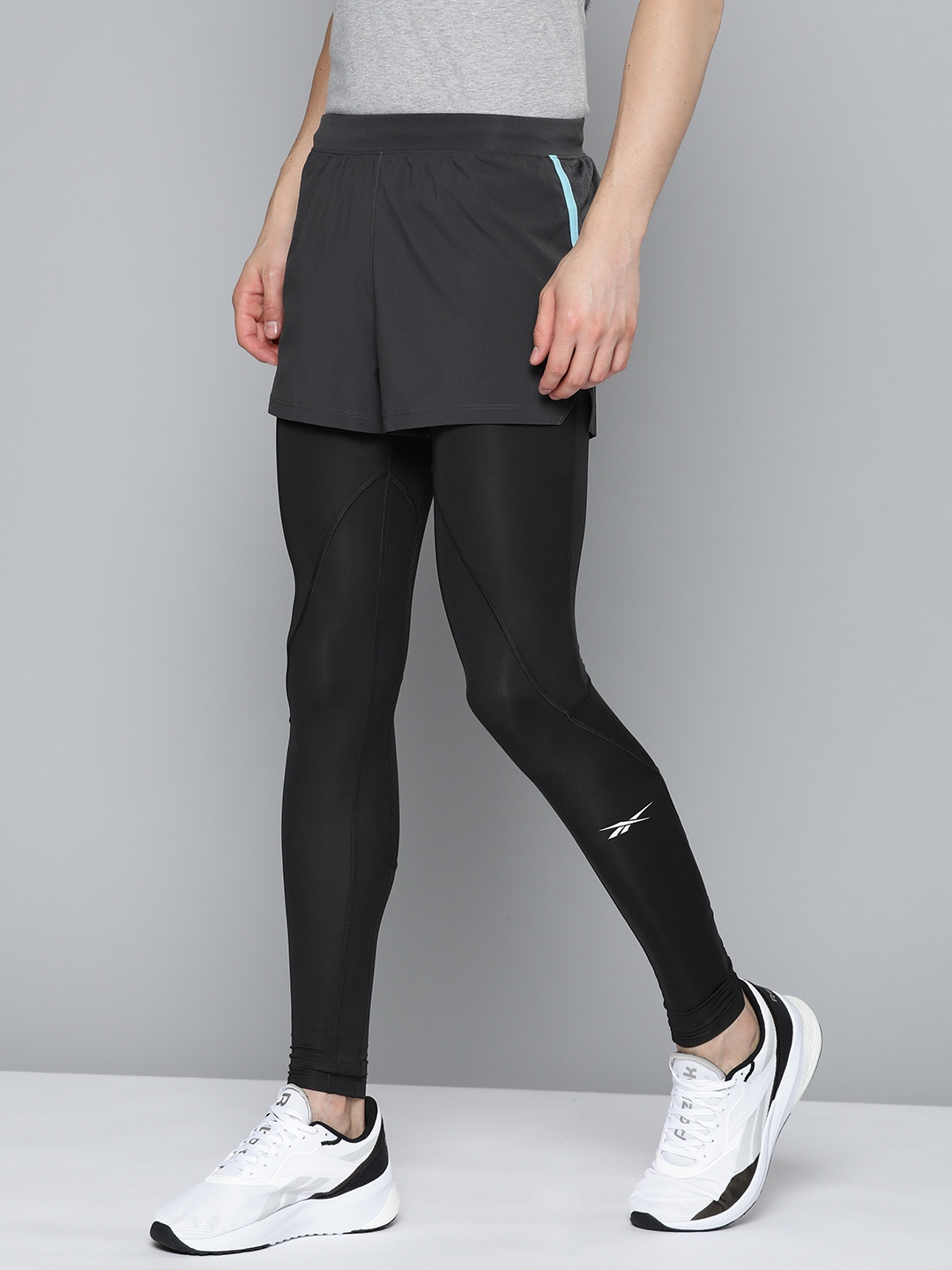 Buy Reebok Men Black Solid Workout Ready Compression Tights Tights for Men 19186486 Myntra
