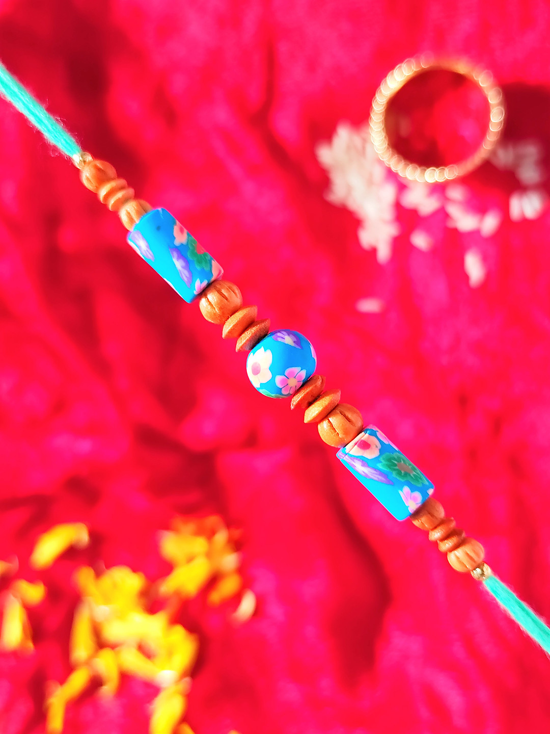 CRAYTON Blue Floral Beaded Thread Rakhi