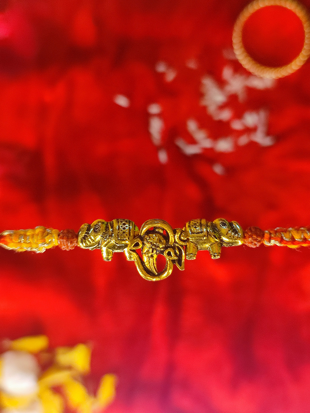 CRAYTON Gold-Toned Gaj Ganpati Beaded Rakhi