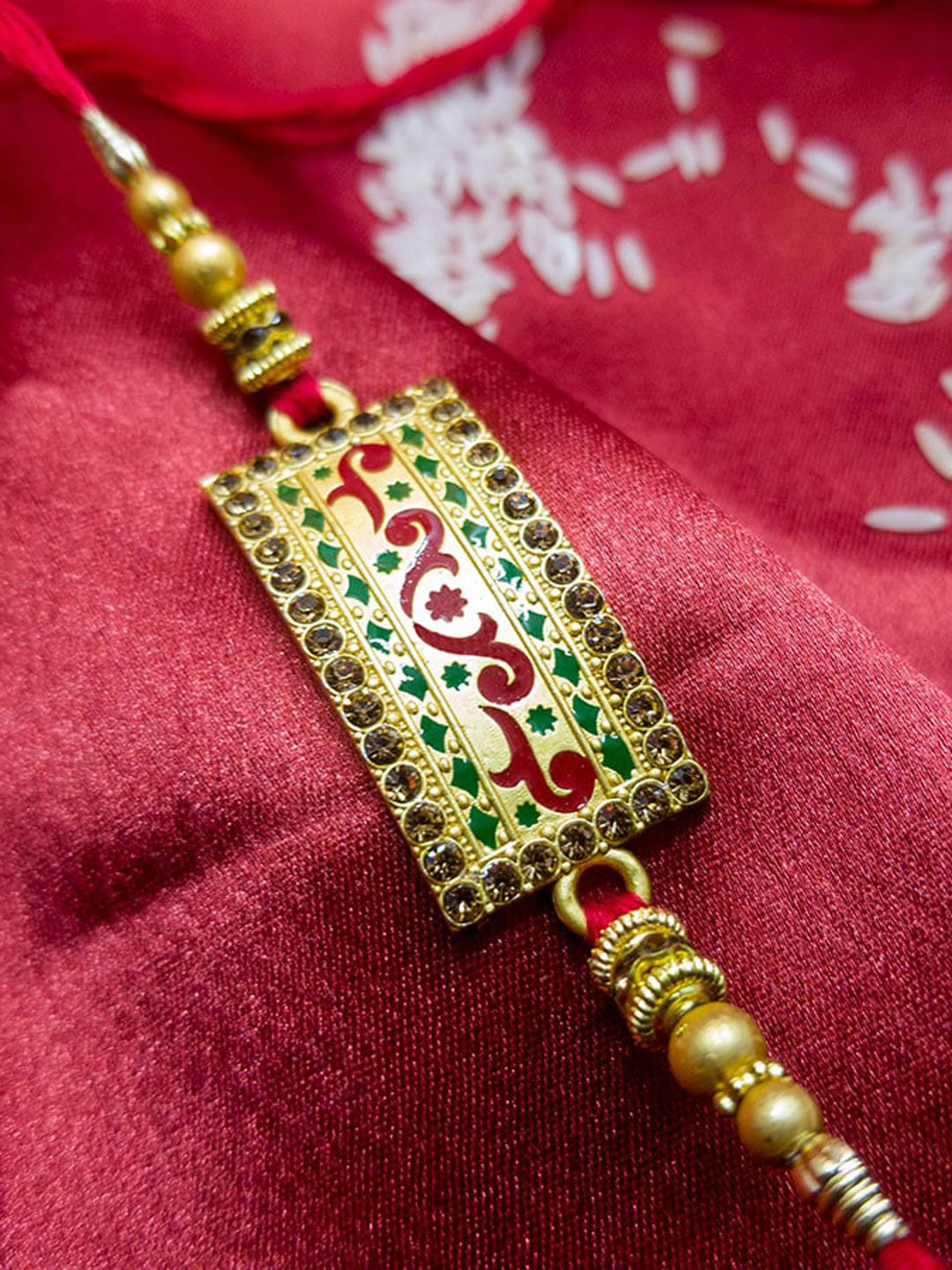 CRAYTON Men Red & Gold Rectangular Diamond Rakhi With Minakari Work