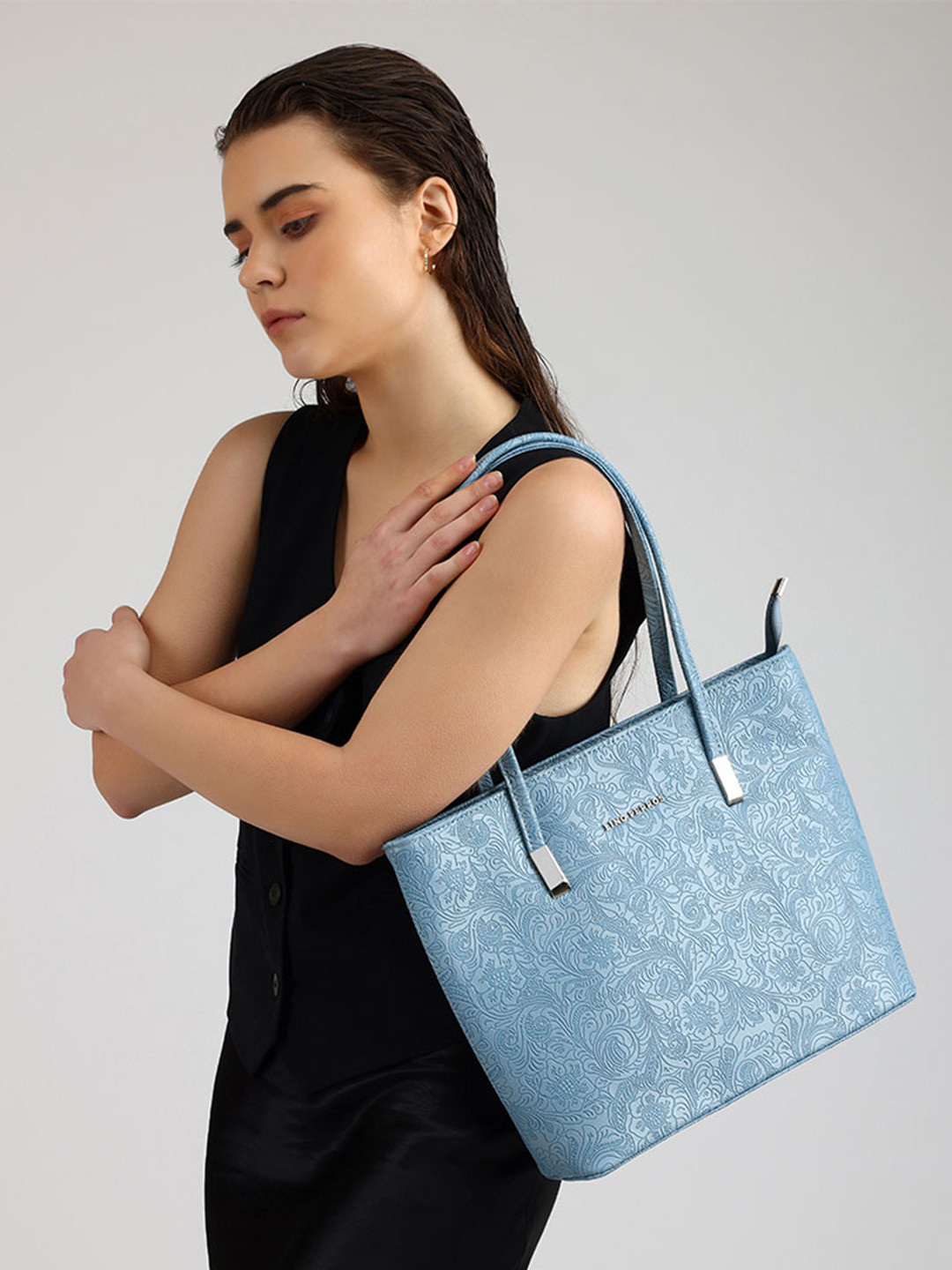 Lino Perros Blue Floral Textured PU Structured Laptop Bag