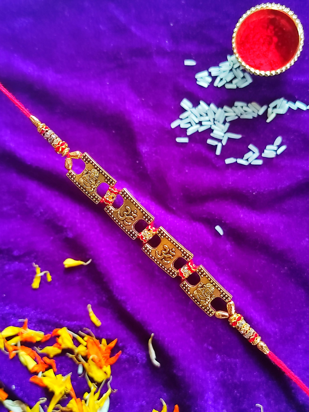 CRAYTON Red Beaded Om & Lord Ganapathi Rakhi With Roli Chawal