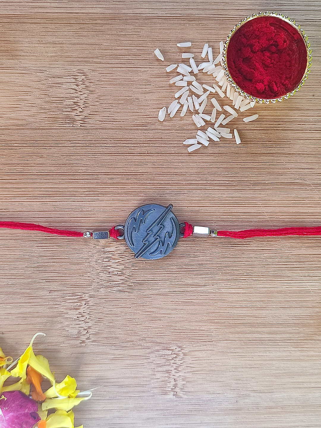 CRAYTON Grey Strike Rakhi With Roli Chawal