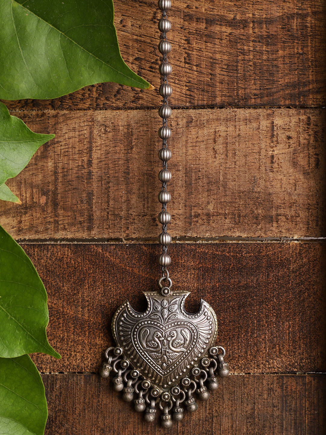 VENI Women Silver-Toned & Plated Oxidised Peacock Ghungroo Maang Tikka