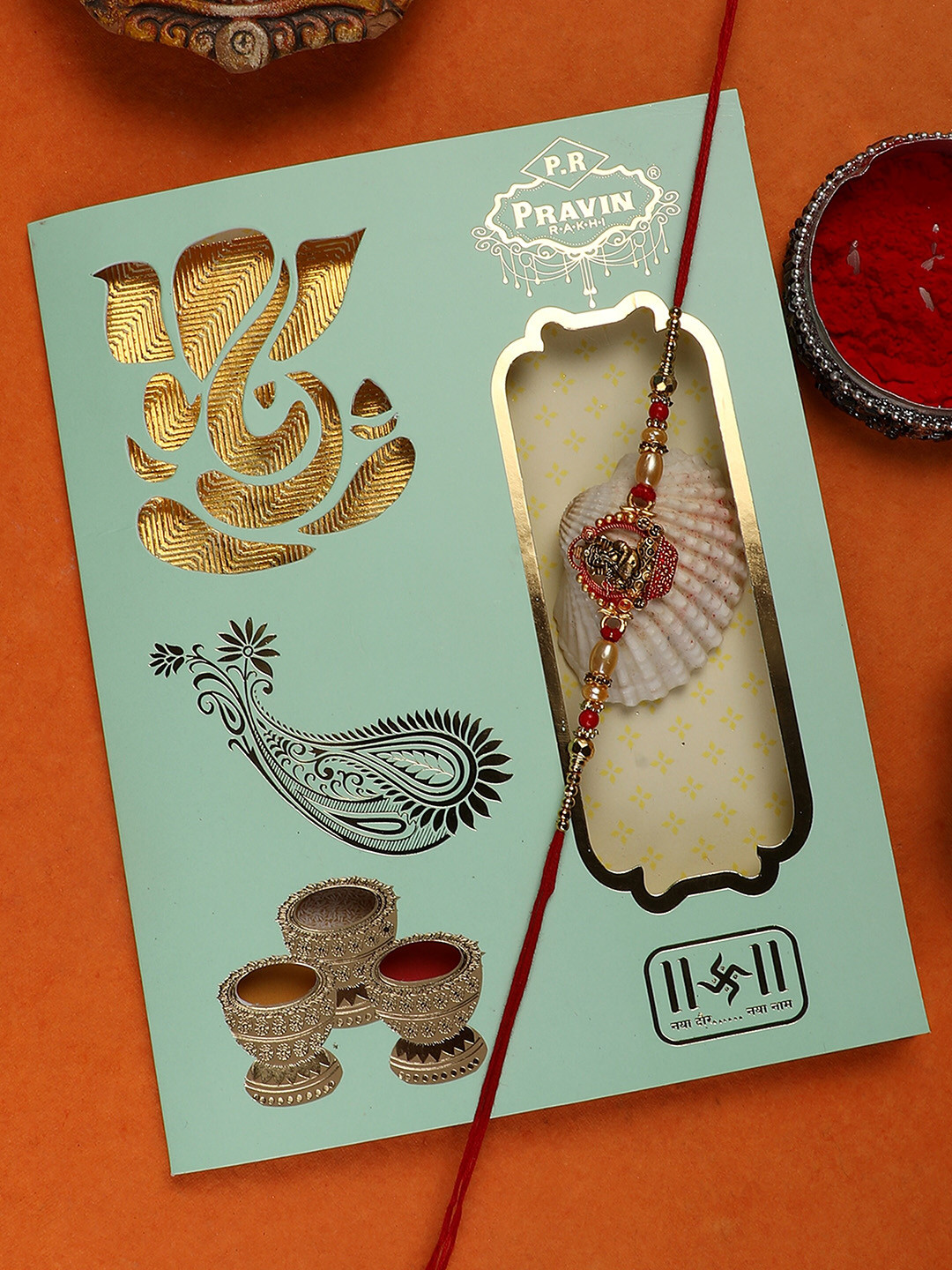 ANIKAS CREATION Red Ganesh Ji Rakhi with Raksha Bandhan Greeting Card