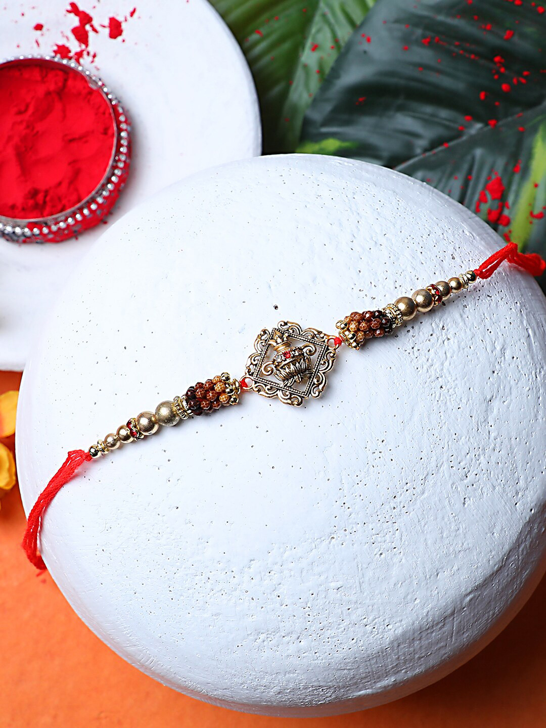 ANIKAS CREATION Red & Gold Brass Handcrafted Kalash Gold-Plated Rakhi Combos