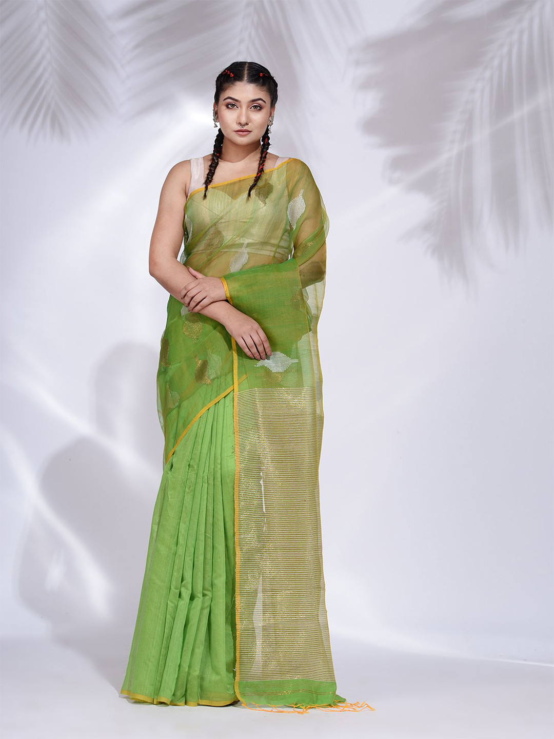 Charukriti Women Green & Gold-Toned Ethnic Motifs woven Design Saree With Zari Pallu Saree